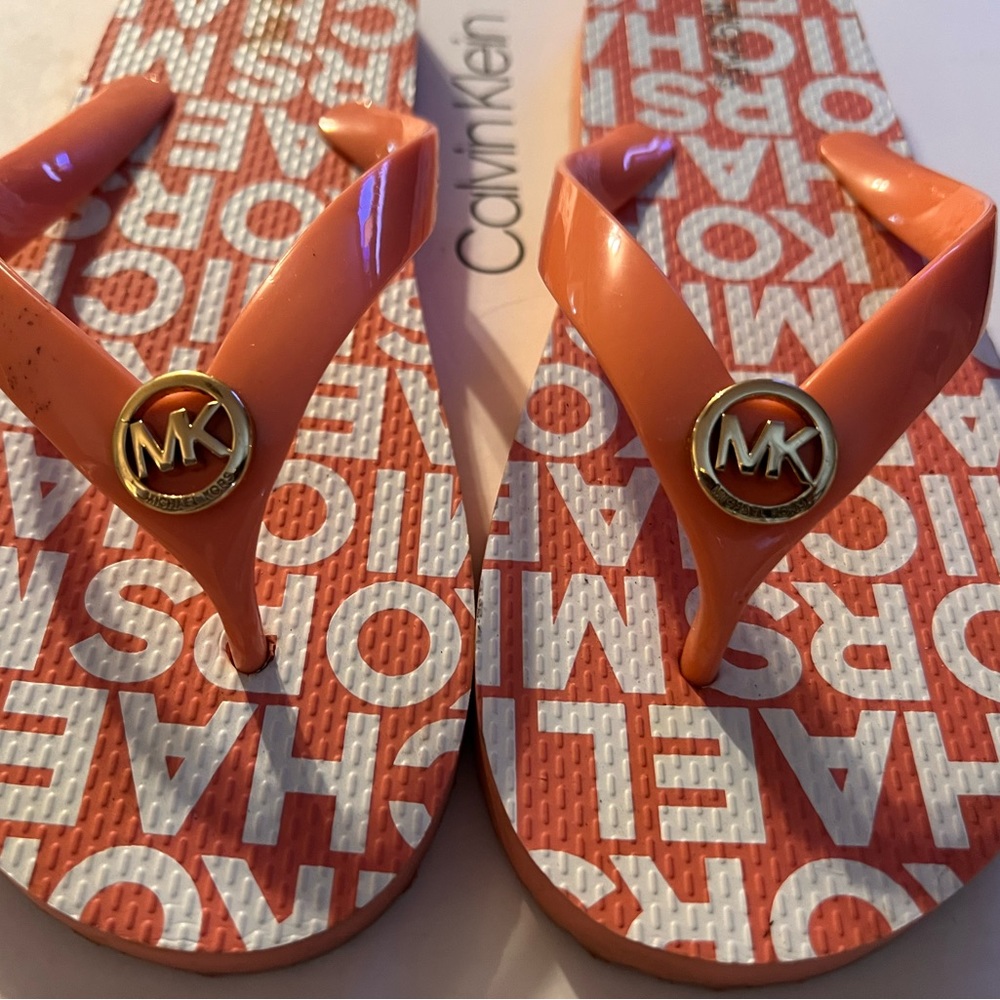 Worn once. Michael Kors flip flops